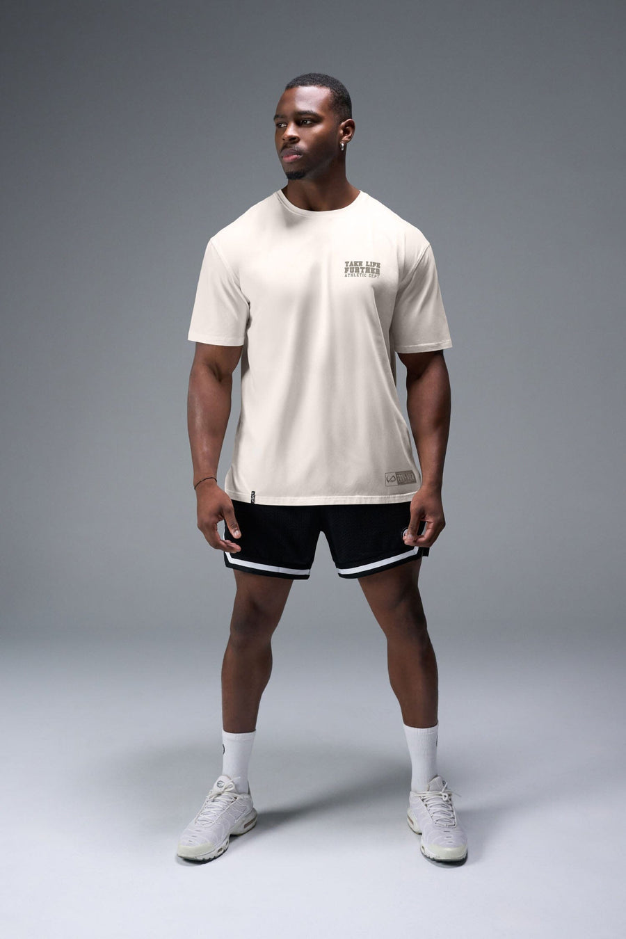 Front View of Off White TLF Digital Camo Cotton Luxe Oversized Tee featuring a pixelated camo print design across the back in our oversized t shirt fit