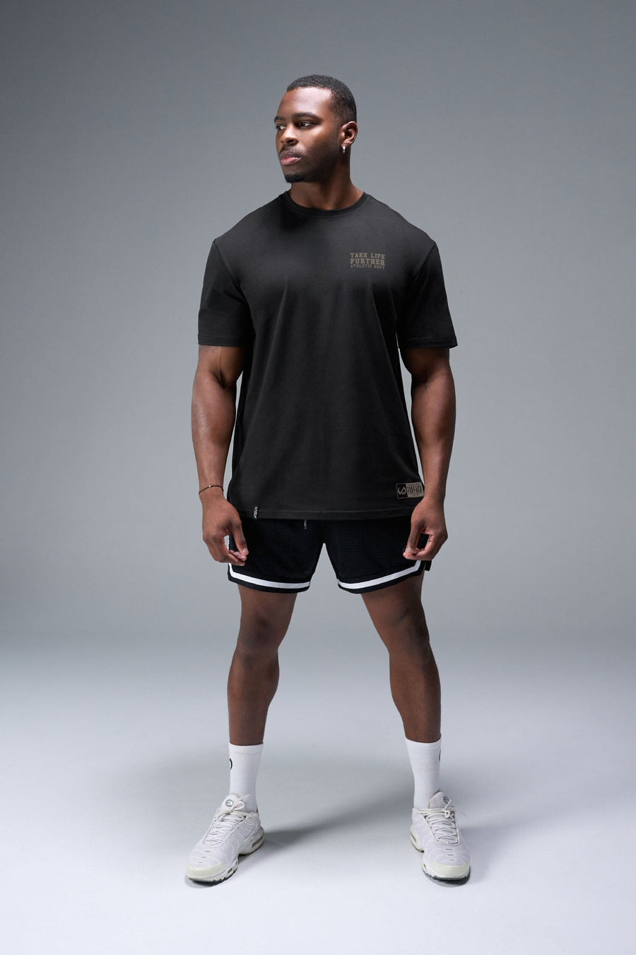 Front View of Black TLF Digital Camo Cotton Luxe Oversized Tee featuring a pixelated camo print design across the back in our oversized t shirt fit