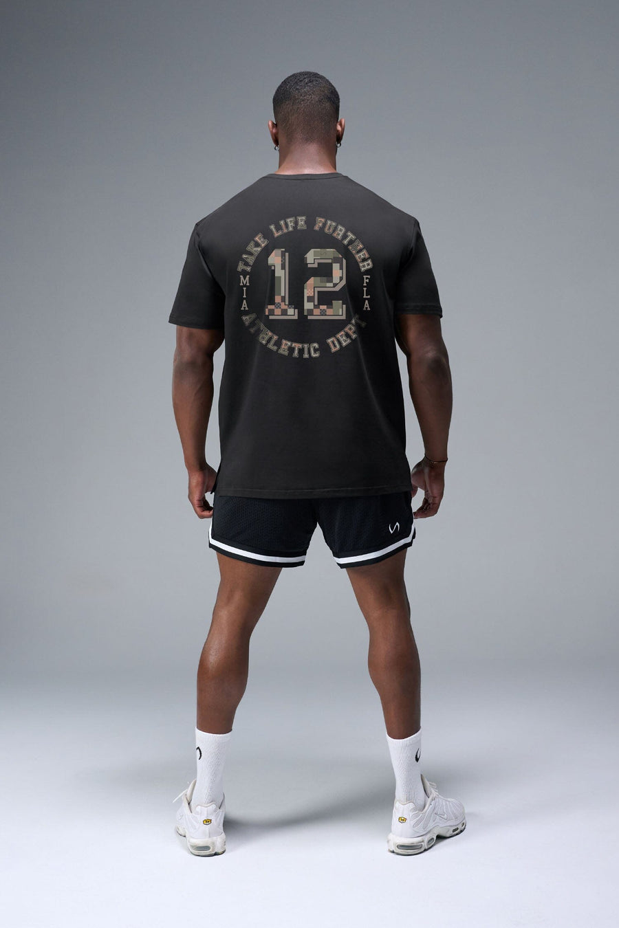 Back View of Black TLF Digital Camo Cotton Luxe Oversized Tee featuring a pixelated camo print design across the back in our oversized t shirt fit