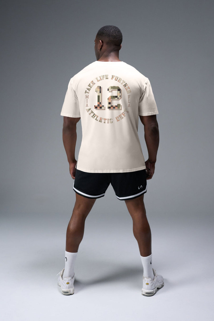 Back View of Off White TLF Digital Camo Cotton Luxe Oversized Tee featuring a pixelated camo print design across the back in our oversized t shirt fit