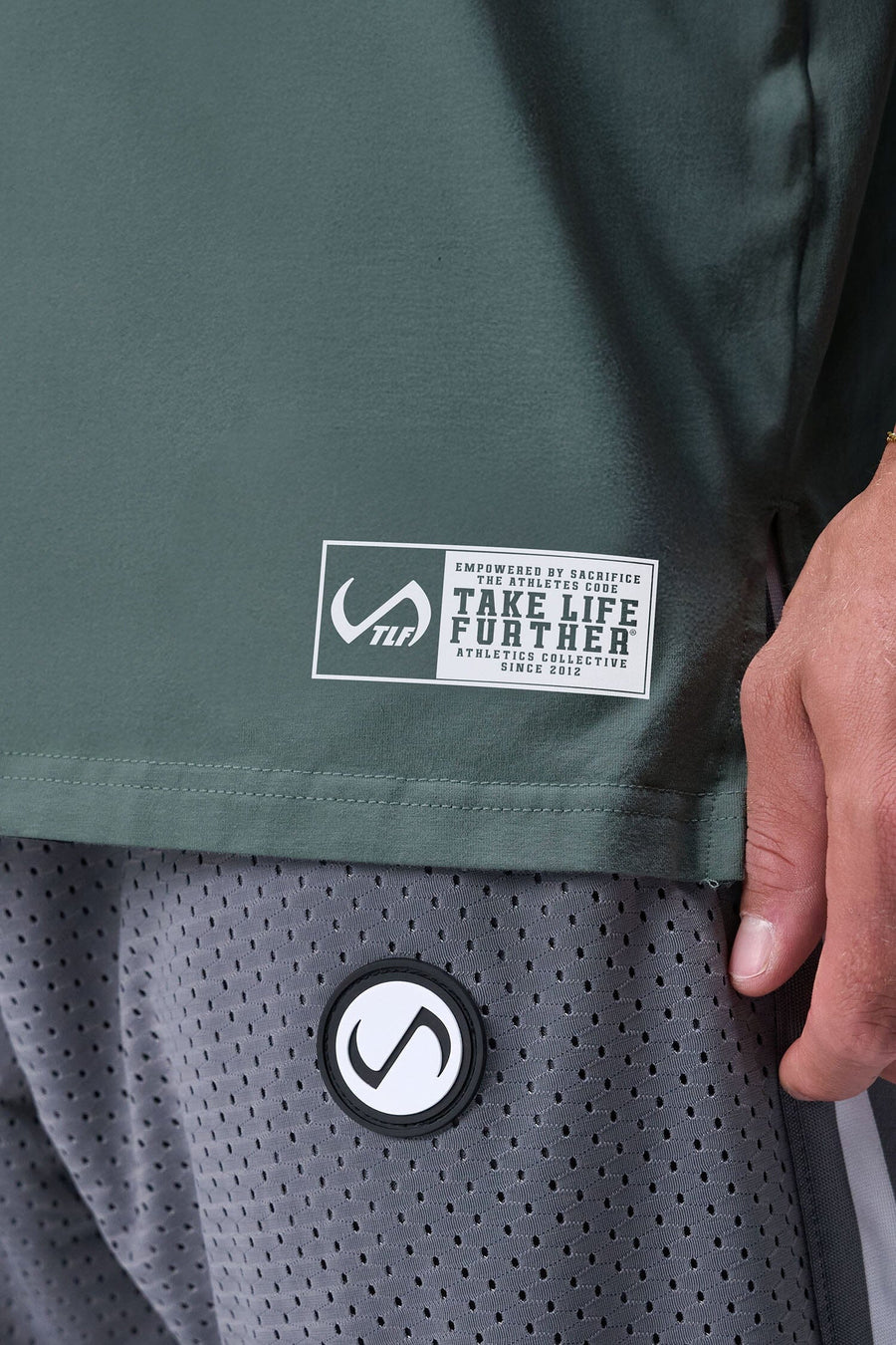 Detail Front View of Green TLF Athletic Dept Cotton Luxe Oversized Tee featuring a bold 2 one graphic print design across the chest in our oversized shirt fit