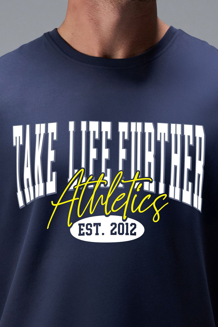 Front View of Blue TLF Athletic Dept Cotton Luxe Oversized Tee featuring a bold 2 one graphic print design across the chest in our oversized shirt fit