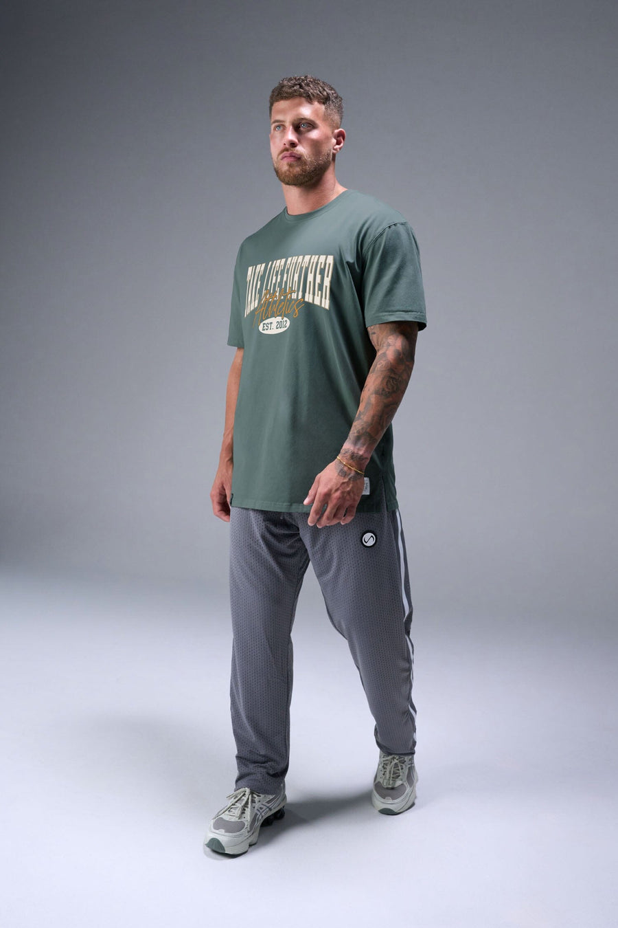 Front View of Green TLF Athletic Dept Cotton Luxe Oversized Tee featuring a bold 2 one graphic print design across the chest in our oversized shirt fit