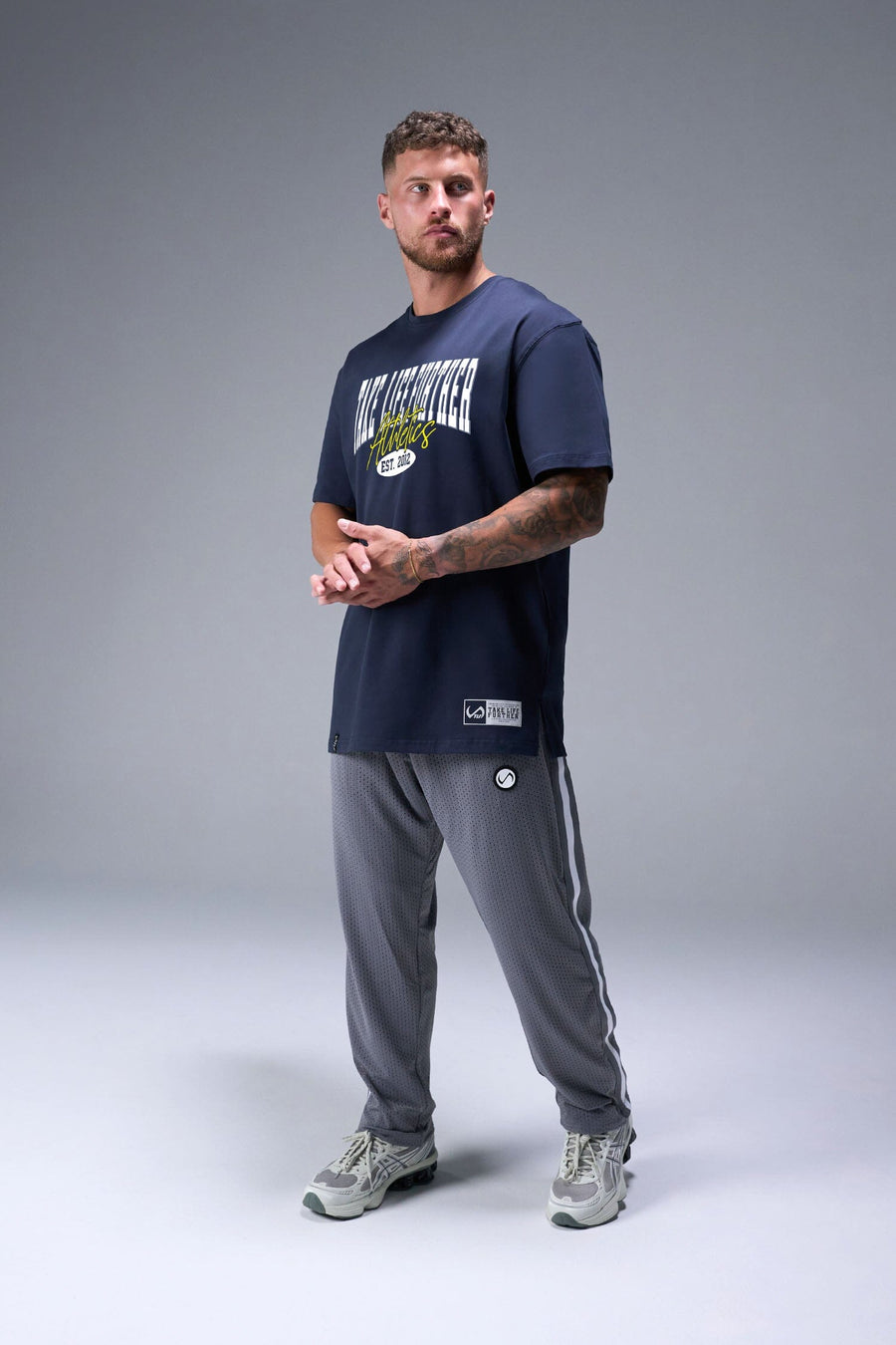 Front View of Blue TLF Athletic Dept Cotton Luxe Oversized Tee featuring a bold 2 one graphic print design across the chest in our oversized shirt fit