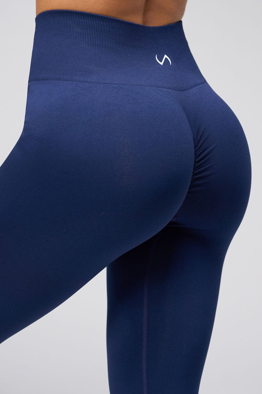 Back View of Cosmic Seamless Scrunch Butt Leggings in Deep Navy