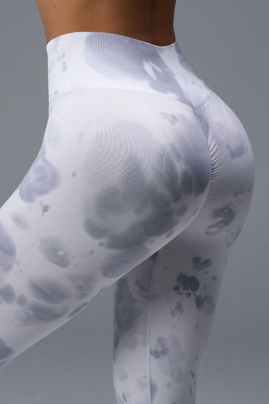 Back View of White TLF Cosmic Seamless Scrunch Butt Leggings, featuring a scrunch butt to shape and contour your glutes