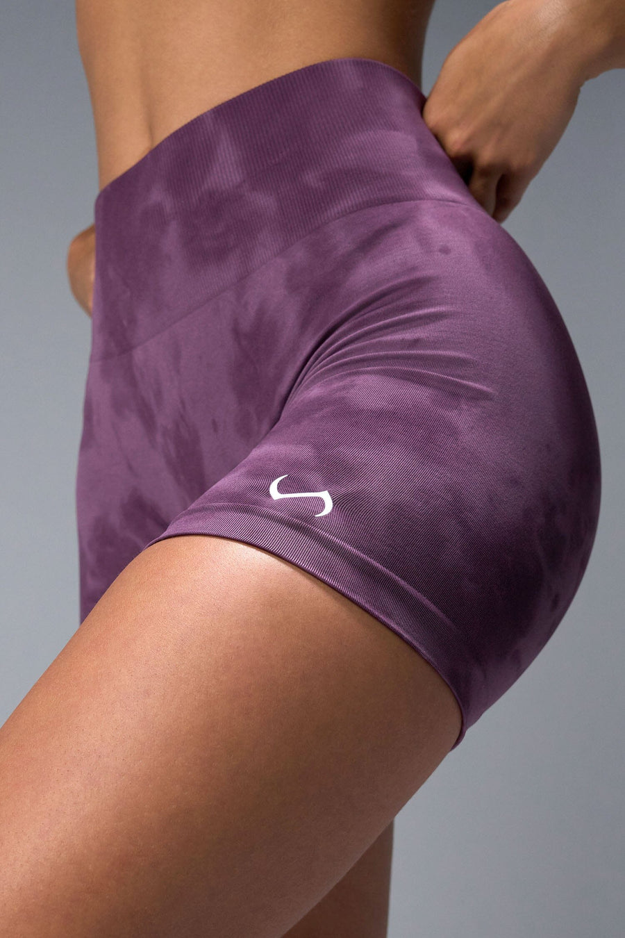 Side View of Purple TLF Cosmic Seamless Scrunch Butt Shorts, featuring a scrunch butt to shape and contour your glutes