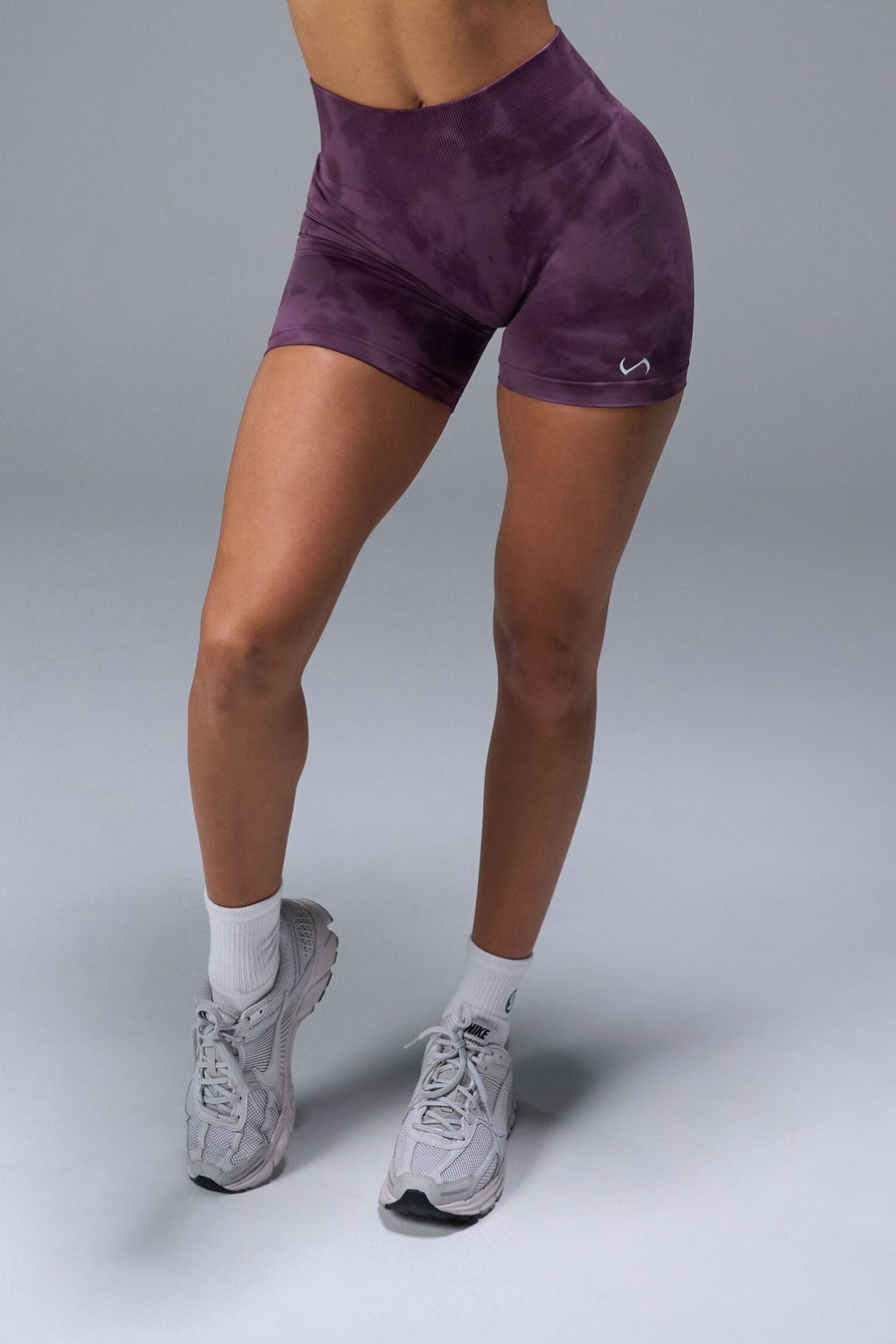 Side View of Purple TLF Cosmic Seamless Scrunch Butt Shorts, featuring a scrunch butt to shape and contour your glutes