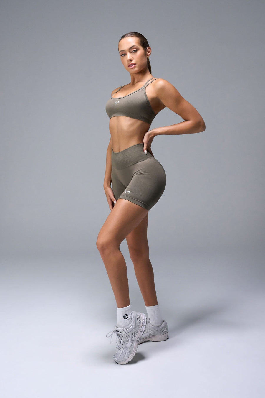 Front View of Brown TLF Cosmic Seamless Scrunch Butt Shorts, featuring a scrunch butt to shape and contour your glutes