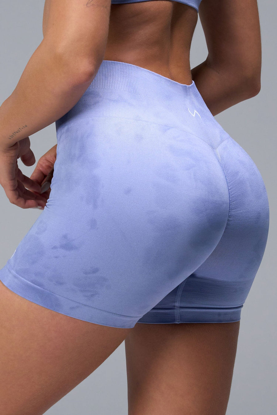 Back View of Blue TLF Cosmic Seamless Scrunch Butt Shorts, featuring a scrunch butt to shape and contour your glutes