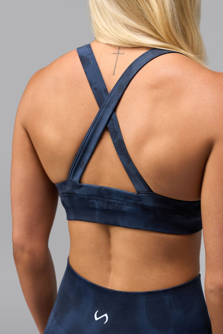 Back View Of Cosmic Seamless Strappy Sports Bra in Midnight Eclipse