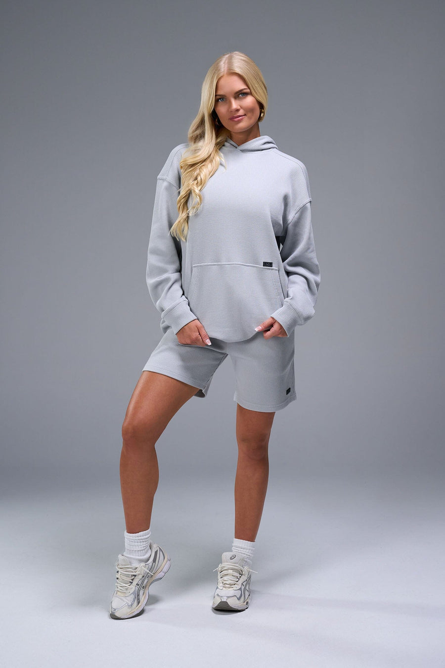 Front View of Gray TLF Elevate Waffle Tech Shorts, featuring a 6” Inch inseam, an athletic relaxed fit with zipper pockets designed for all day wear