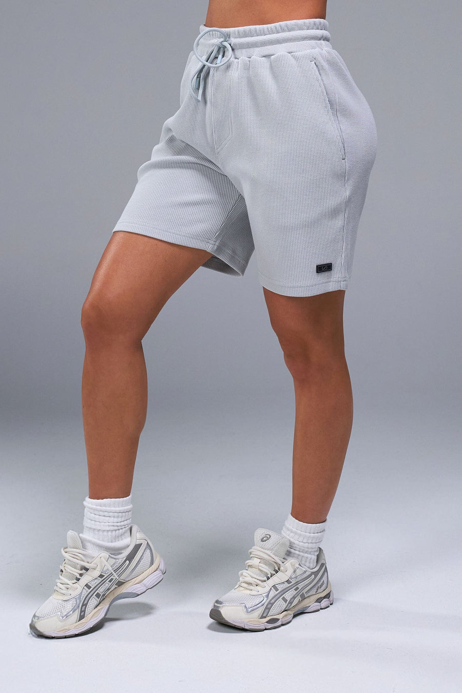 Front View of Gray TLF Elevate Waffle Tech Shorts, featuring a 6” Inch inseam, an athletic relaxed fit with zipper pockets designed for all day wear