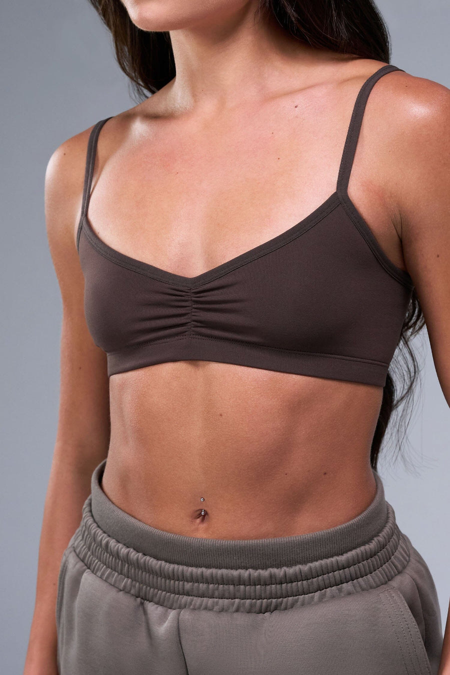 Front View of Brown TLF Essential Scrunch Seamless Bralette, featuring adjustable straps for a custom fit and scrunch front design