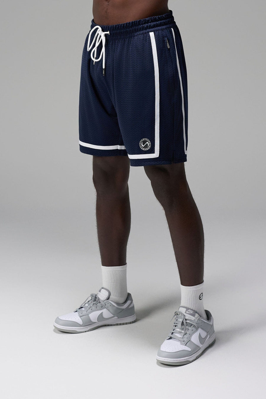 Front View of Blue GTS Athletic 8 Inch Shorts, featuring an 8-inch inseam and zipper pockets