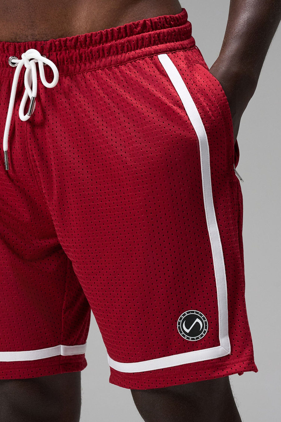 Front View of Red GTS Athletic 8 Inch Shorts, featuring an 8-inch inseam and zipper pockets