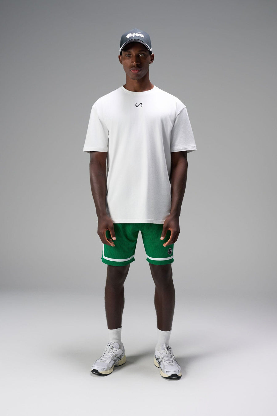 Front View of Green GTS Athletic 8 Inch Shorts, featuring an 8-inch inseam and zipper pockets