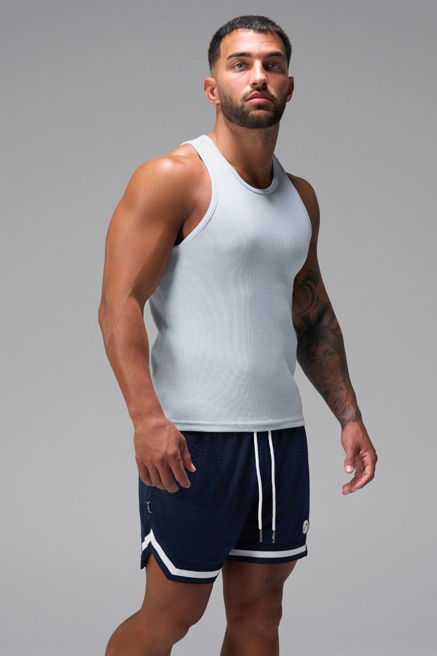 Front View of Blue GTS Evolve Mesh 6 Inch Shorts, featuring dual side pockets and 6 inch inseam for performance and functionality