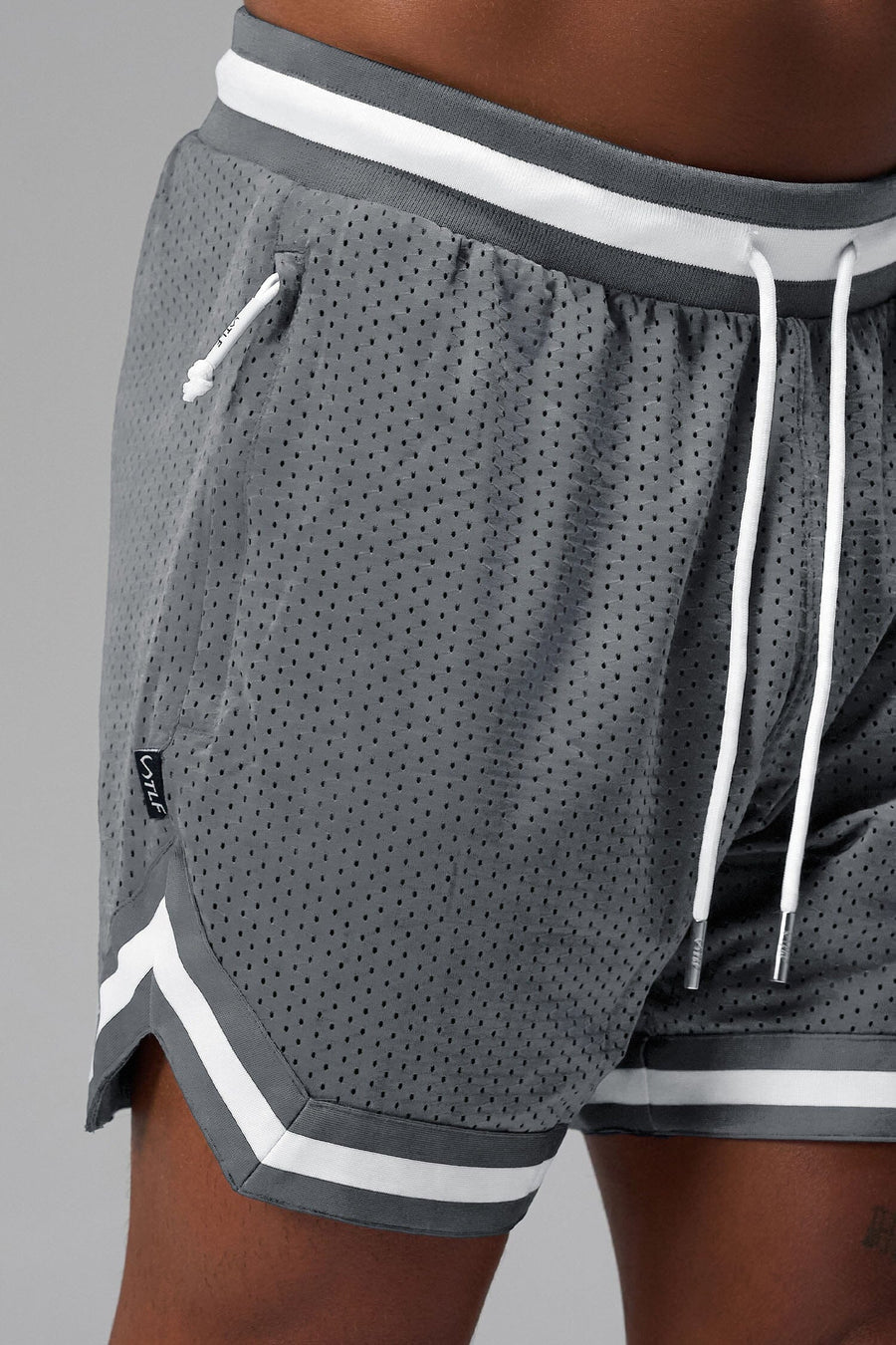 Front View of Gray GTS Evolve Mesh 6 Inch Shorts, featuring dual side pockets and 6 inch inseam for performance and functionality