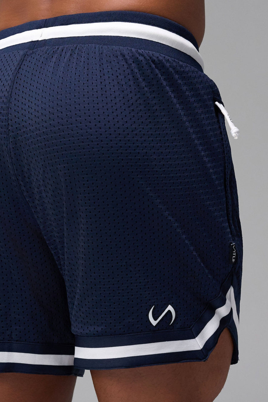 Back View of Blue GTS Evolve Mesh 6 Inch Shorts, featuring dual side pockets and 6 inch inseam for performance and functionality