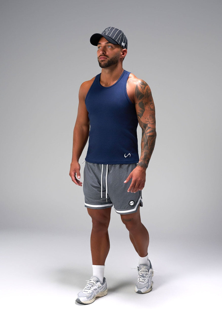 Front View of Gray GTS Evolve Mesh 6 Inch Shorts, featuring dual side pockets and 6 inch inseam for performance and functionality