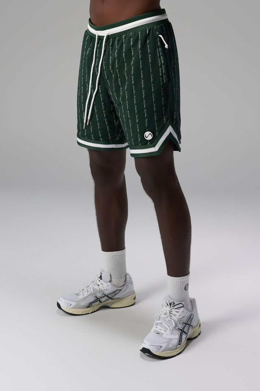 Front View of Green GTS Evolve Mesh 8 Inch Shorts, featuring an 8-inch inseam, custom pinstripe design and zipper pockets