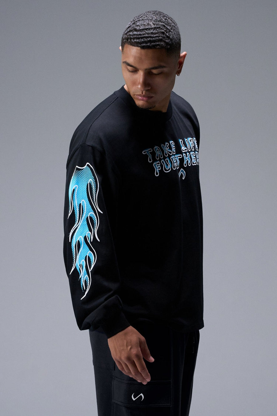 Side View of Black TLF GTS Oversized Heavy Weight Long Sleeve, durable and versatile for gym or street wear