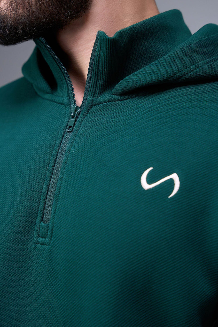Detail Front View of Dark Harvest Green TLF GTS Twill Tech Quarter-Zip Hoodie, featuring contrast stitching, kangaroo pockets and unmatched style