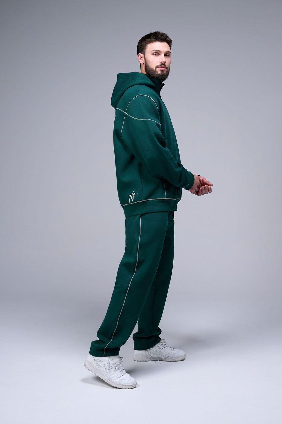 Right Side View of Dark Harvest Green TLF GTS Twill Tech Quarter-Zip Hoodie, featuring contrast stitching, kangaroo pockets and unmatched style