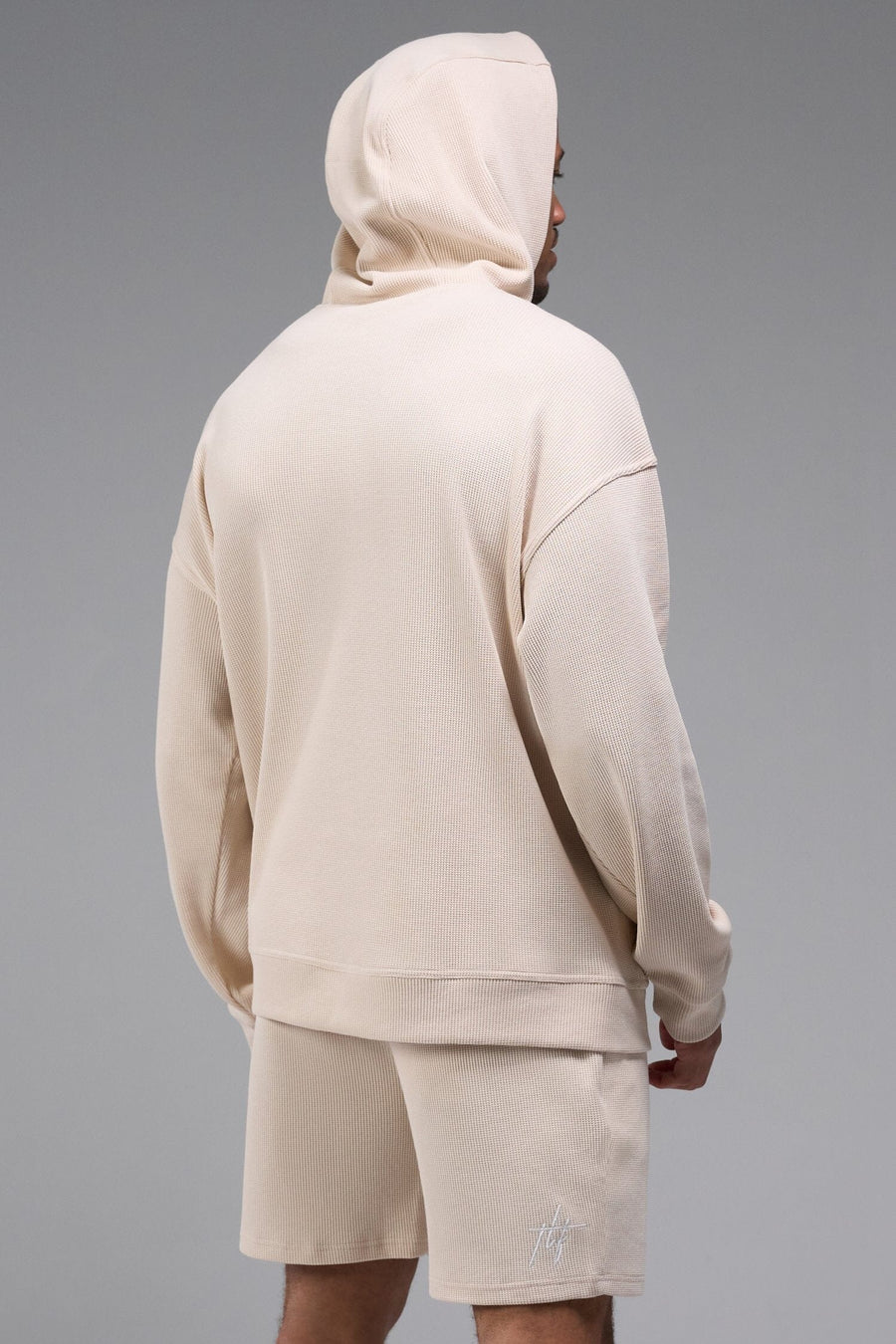 Back View of White TLF GTS Waffle Tech Hoodie, featuring kangaroo pockets, and double panel hoodie designed for all day wear