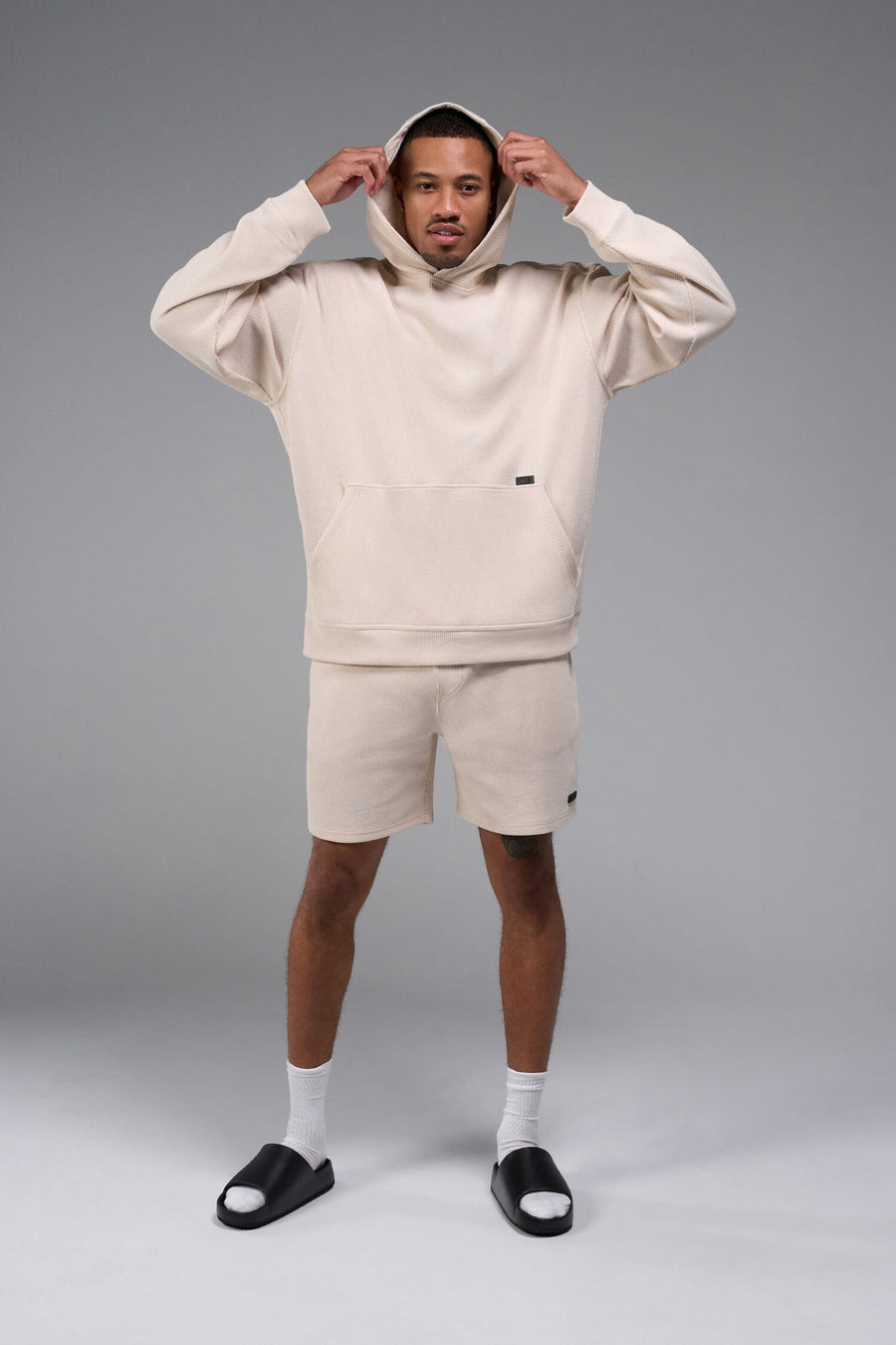 Front View of White TLF GTS Waffle Tech Hoodie, featuring kangaroo pockets, and double panel hoodie designed for all day wear