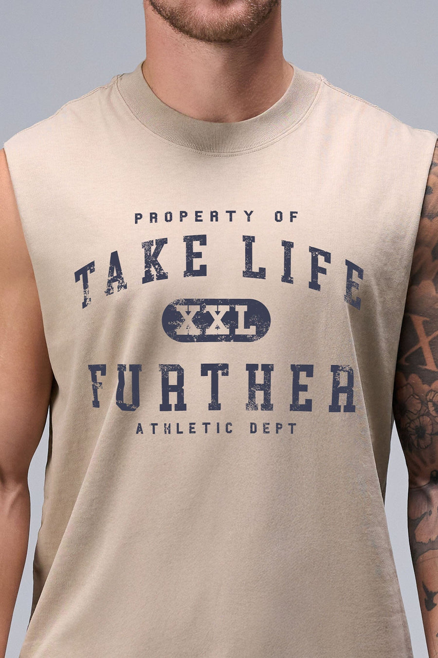 Front View of Tan TLF Property Of Heavy Cotton Muscle Tank featuring a distressed graphic design and raw edge arm holes.