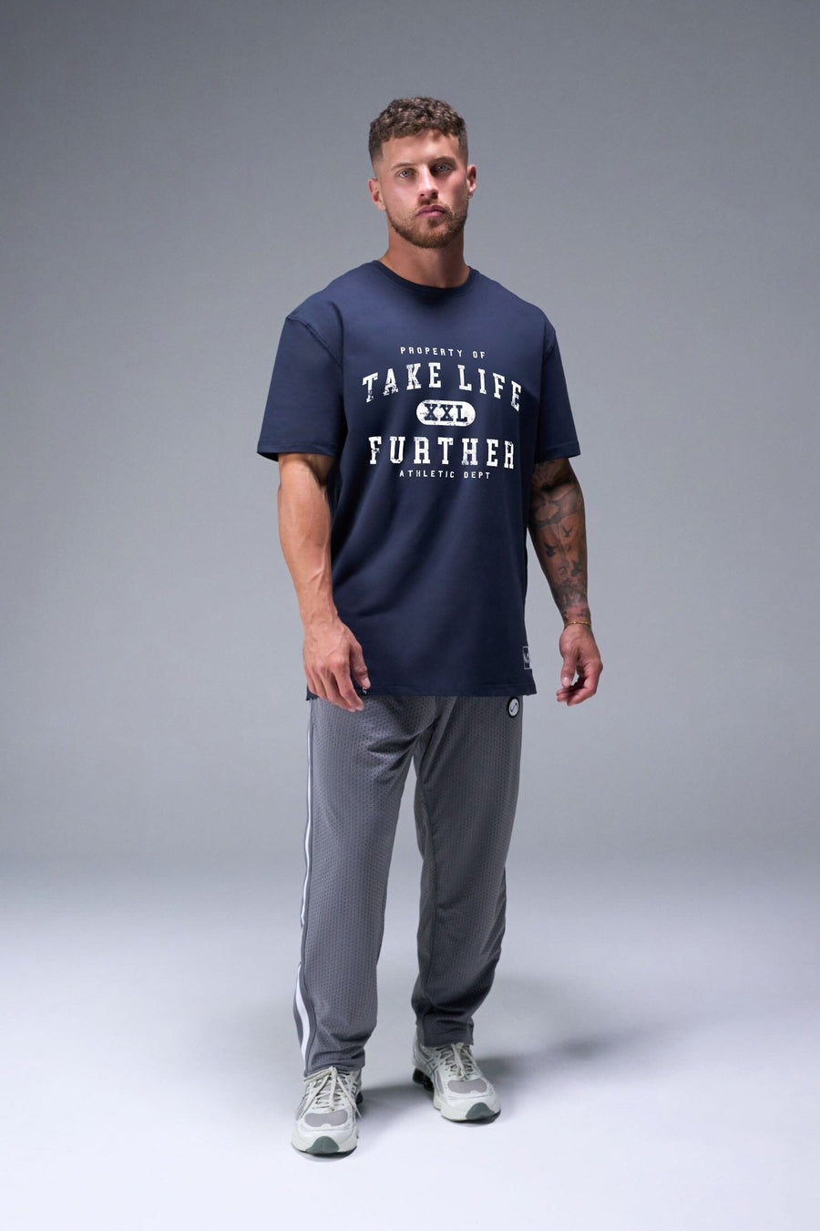 Front View of Blue TLF Property of Cotton Luxe Oversized Tee featuring a distressed graphic print design across the chest in our oversized t shirt fit