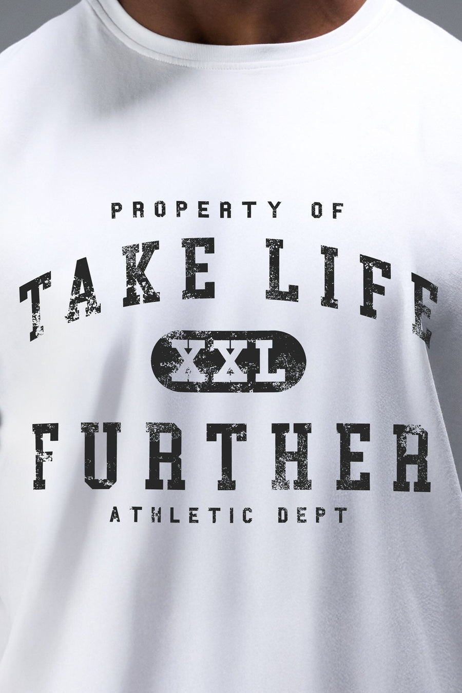 Detail Front View of White TLF Property of Cotton Luxe Oversized Tee featuring a distressed graphic print design across the chest in our oversized t shirt fit