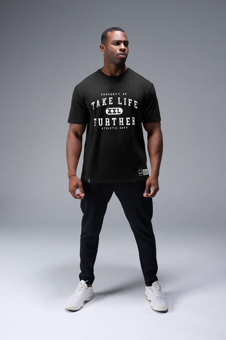 Front View of Black TLF Property of Cotton Luxe Oversized Tee featuring a distressed graphic print design across the chest in our oversized t shirt fit