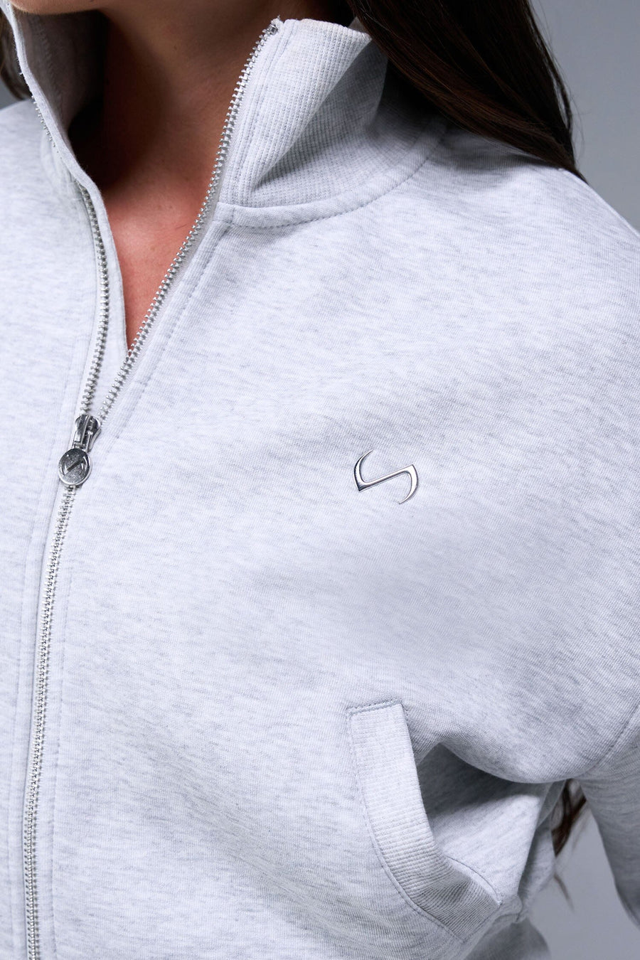 Detail Front View of Gray TLF Scuba Tech Cropped Zip Up Jacket, featuring side zipper pockets, thumbholes and a cropped length