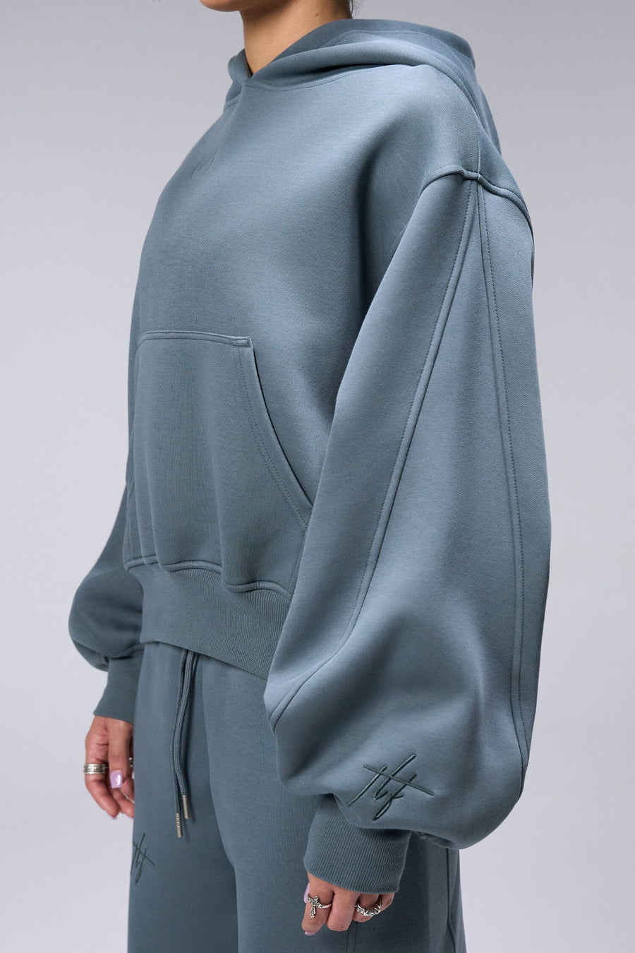 Front View Of Women's Scuba Tech Oversized Cropped Hoodie in Stormy Weather
