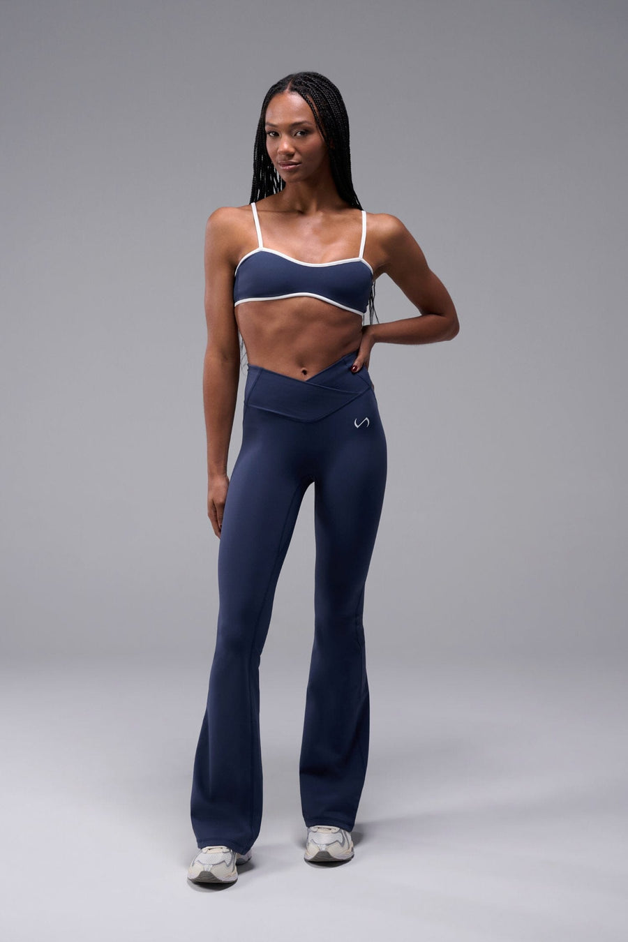 Front View of Blue Tempo Minimal Bralette 2.0, featuring removable pads and adjustable straps for low impact all day wear