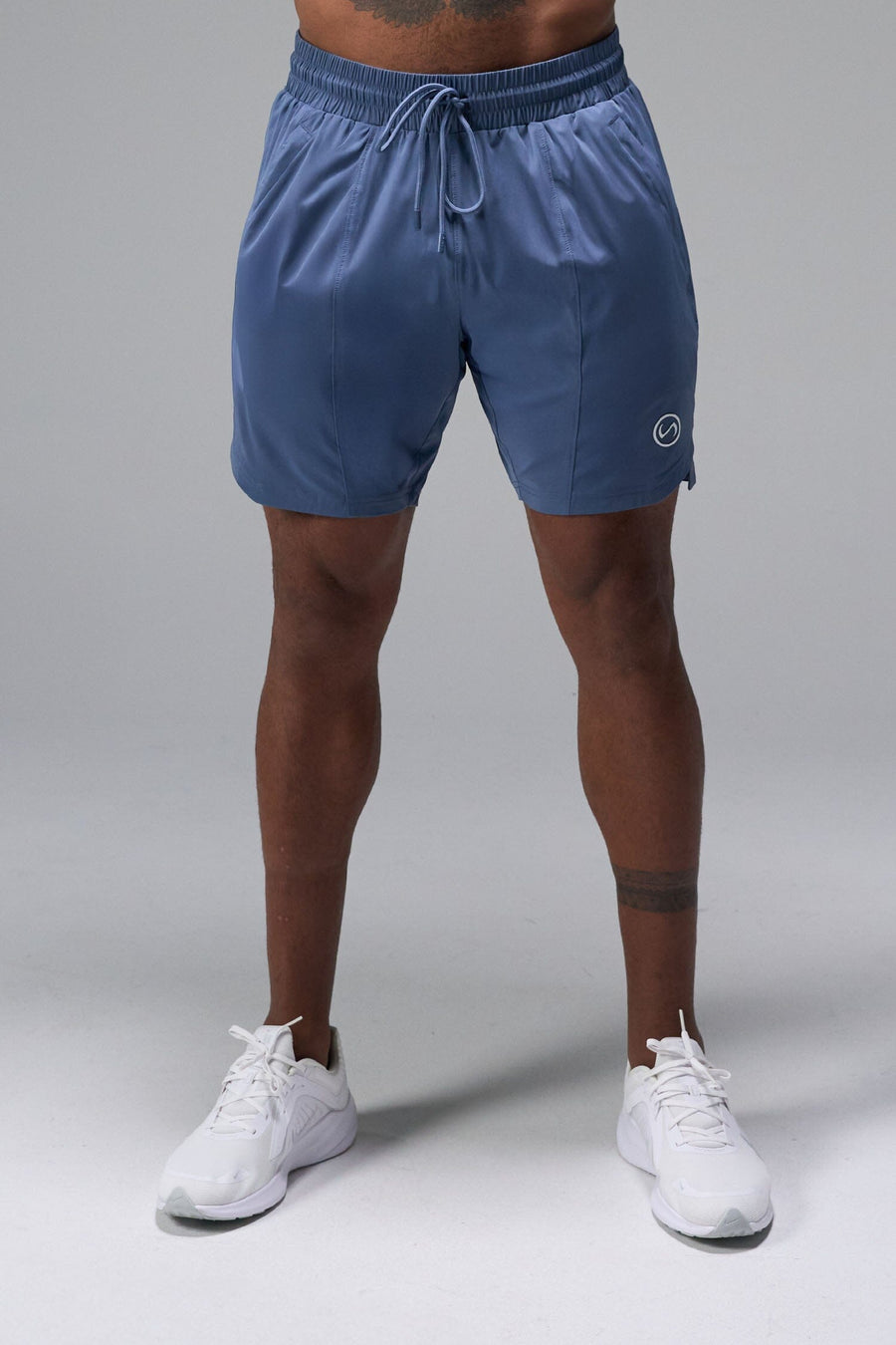Front View of Blue TLF Train Element 7 Inch Shorts featuring a 7 inch in seam and side zipper pockets designed for optimal performance