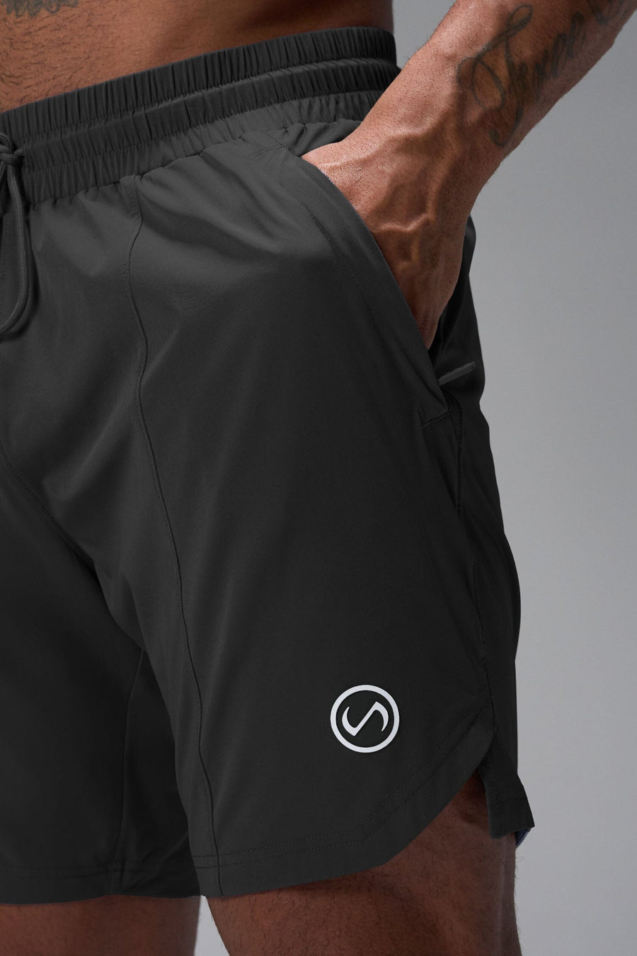 Front View of Black TLF Train Element 7 Inch Shorts featuring a 7 inch in seam and side zipper pockets designed for optimal performance