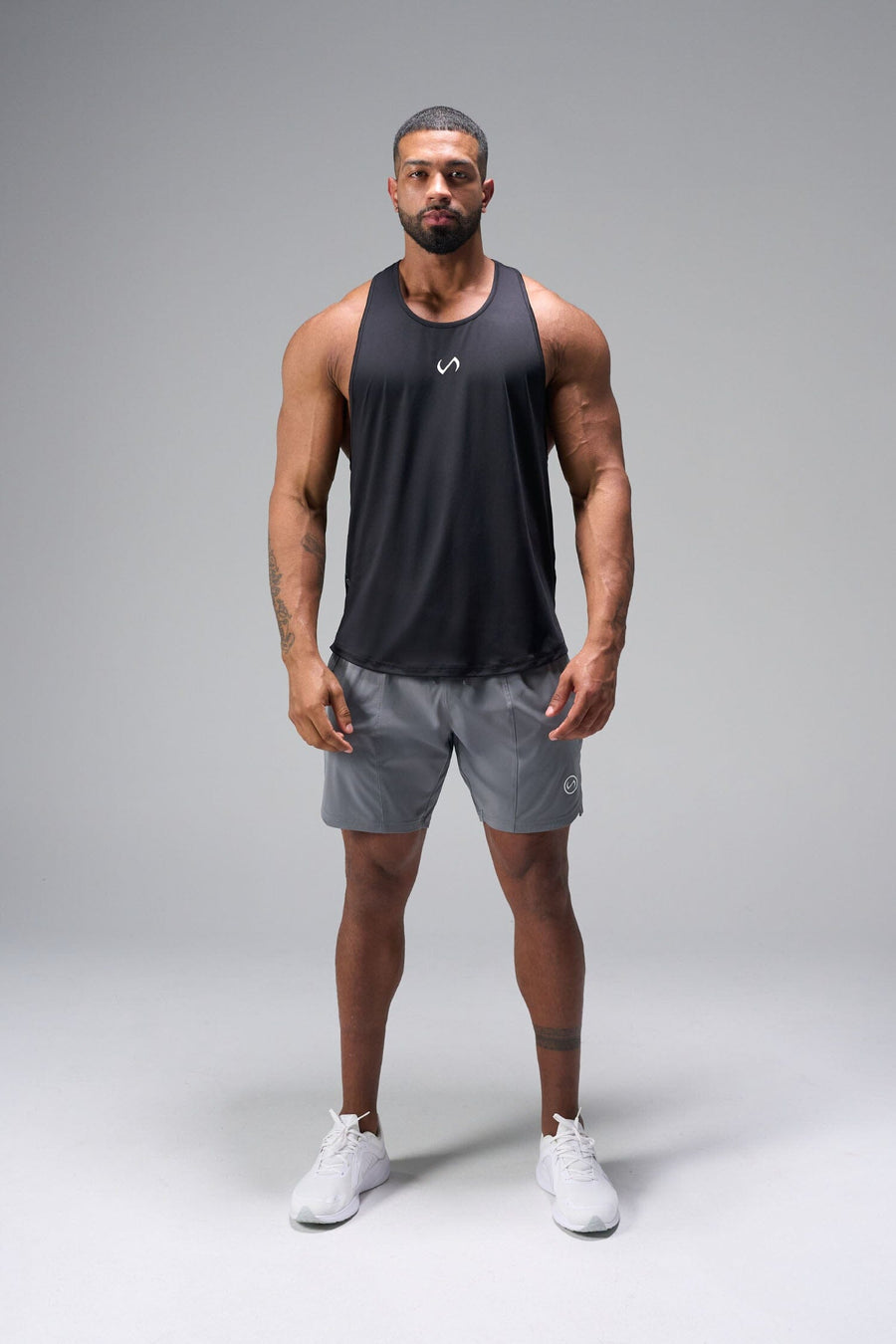 Front View of Gray TLF Train Element 7 Inch Shorts featuring a 7 inch in seam and side zipper pockets designed for optimal performance