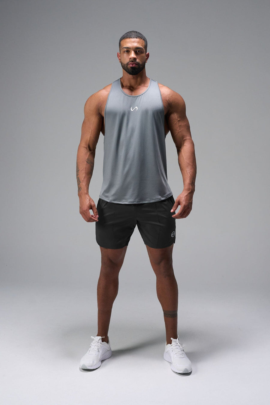 Front View of Black TLF Train Element 7 Inch Shorts featuring a 7 inch in seam and side zipper pockets designed for optimal performance