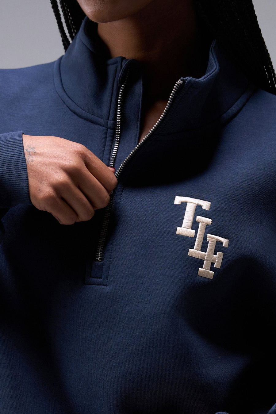 Detail Front View of Blue Nights TLF Unisex GTS Scuba Tech Quarter-Zip Pullover, featuring a 1/4 zip pullover sweatshirt with kangaroo pockets
