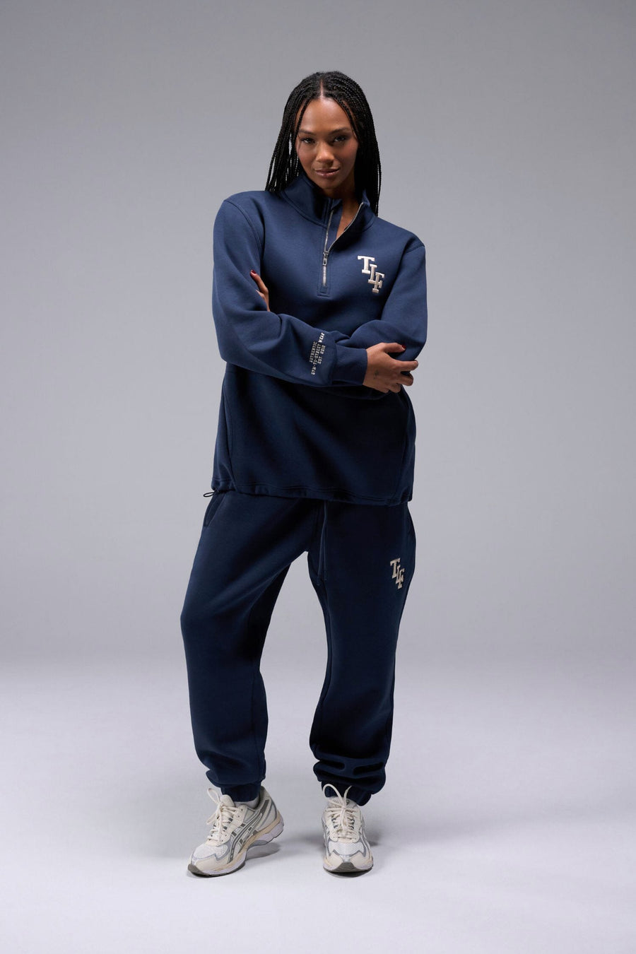 Front View of Blue Nights TLF Unisex GTS Scuba Tech Quarter-Zip Pullover, featuring a 1/4 zip pullover sweatshirt with kangaroo pockets