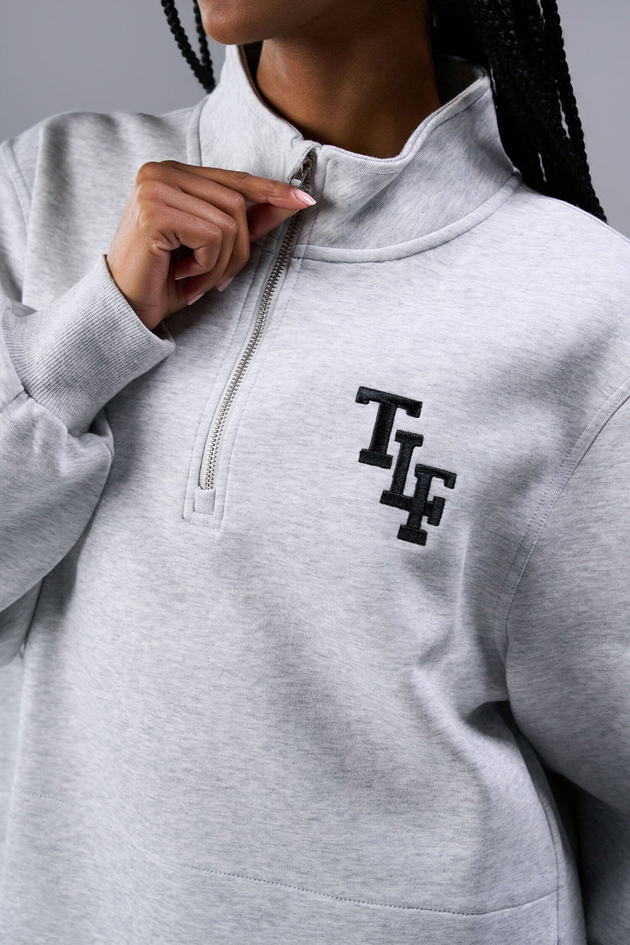 Detail Front View of Light Heather Gray TLF Unisex GTS Scuba Tech Quarter-Zip Pullover, featuring a 1/4 zip pullover sweatshirt with kangaroo pockets