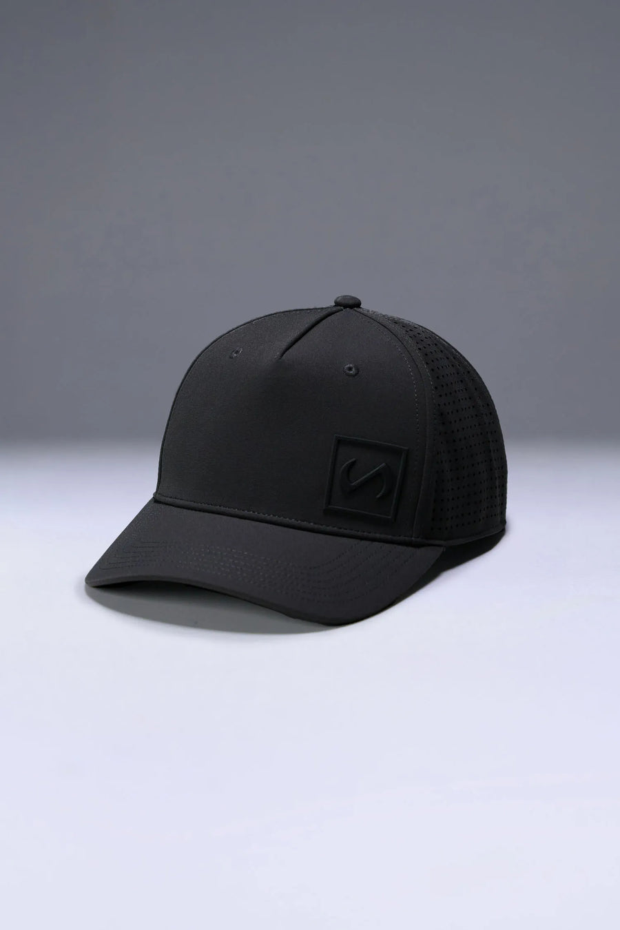 Black Aero Core Performance Gym Hat with laser ventilation, water-repellent fabric and structured snapback fit by TLF Apparel – front view 