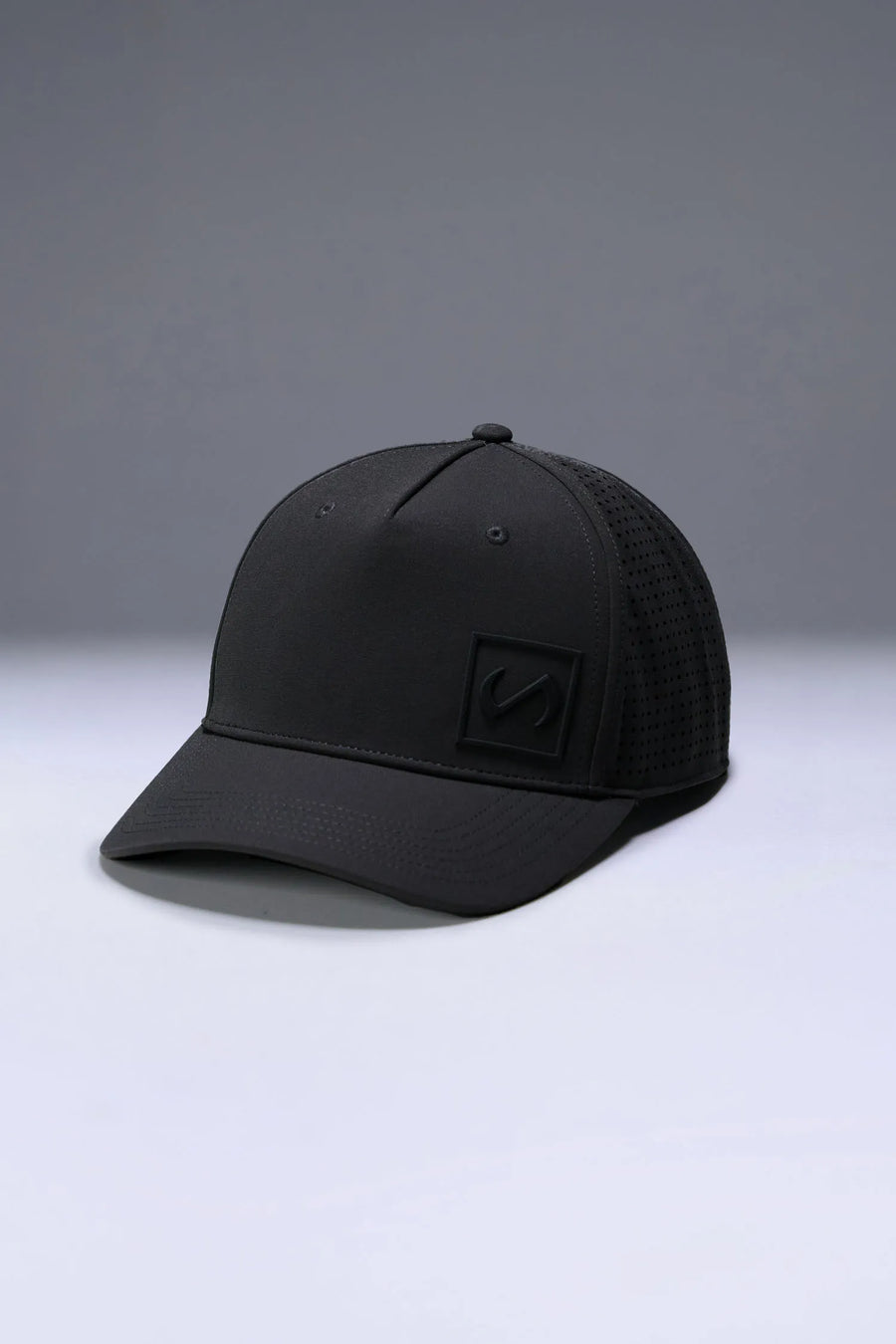 Black Aero Core Performance Snapback Hat with structured athletic fit and adjustable stretch closure by TLF Apparel – side view 