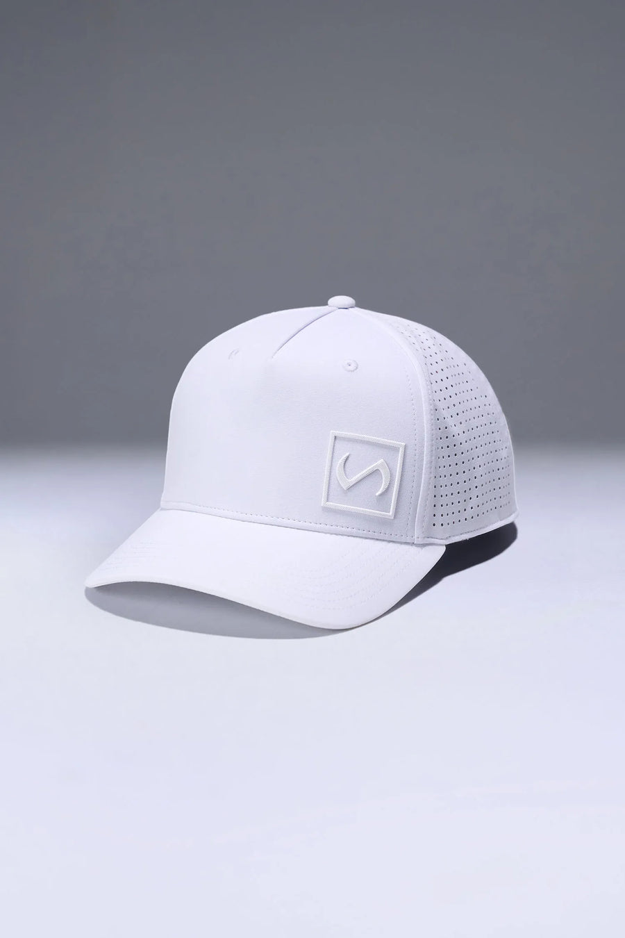 White Aero Core Performance Gym Hat with laser ventilation, water-repellent fabric and structured snapback fit by TLF Apparel – front view 