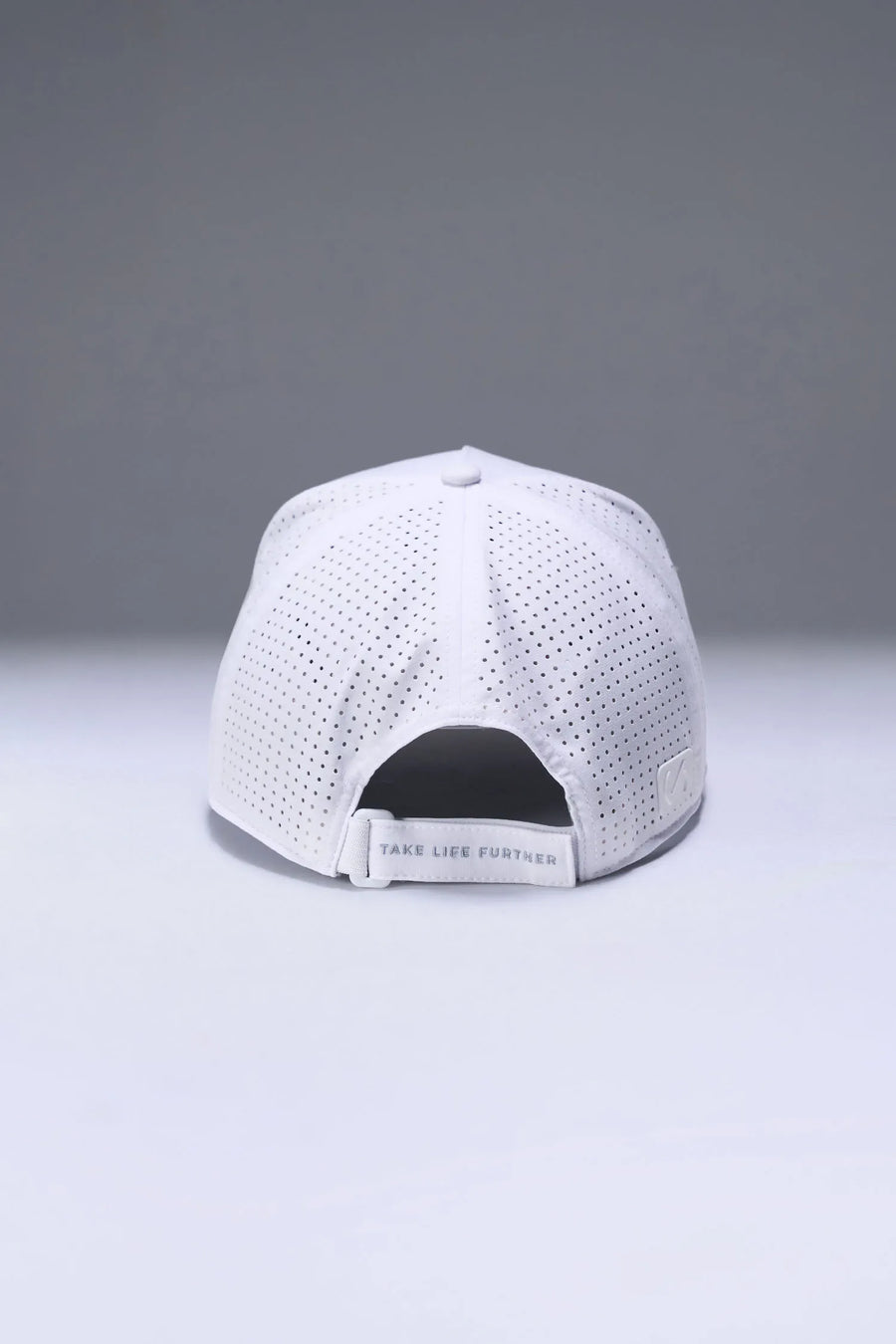 White Aero Core Performance Gym Hat with laser ventilation, water-repellent fabric and structured snapback fit by TLF Apparel – back view 
