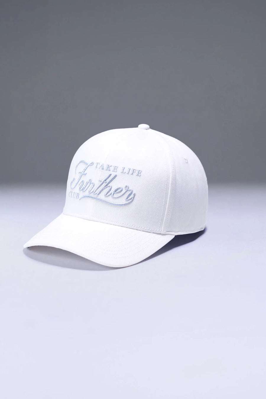 White Classic Further Cotton Hat showing curved brim profile and athletic fit for workouts and everyday wear by TLF Apparel – side view 